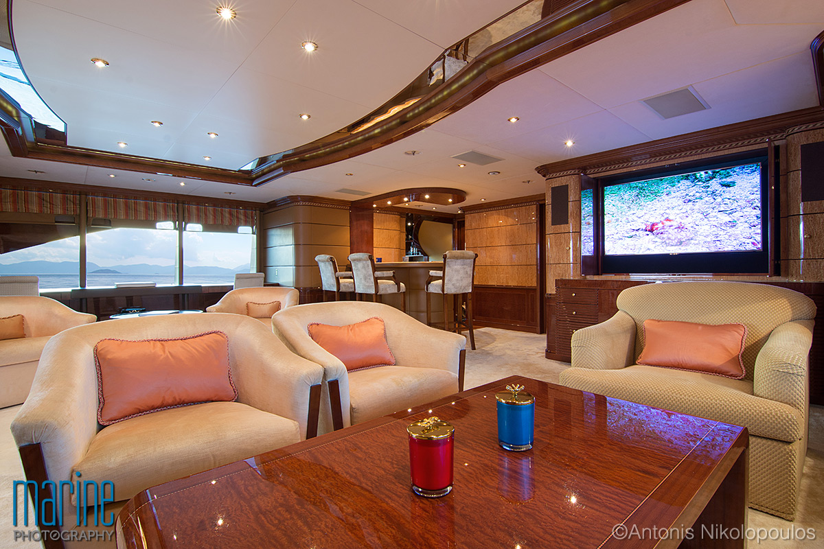 Luxury motor yacht photography. The small Lounge captured late in the afternoon. 
